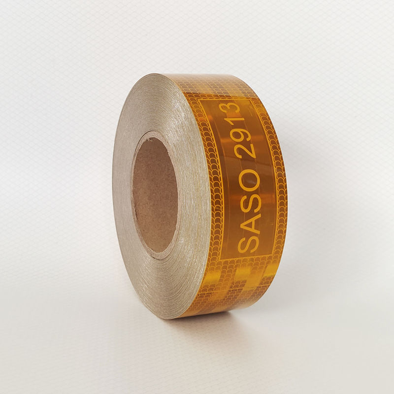Pasar Arab Saudi Custom Pet Metalized 50mm Menonjol Hi Vis Kuning Saso 2913 Pita reflektif untuk Kendaraan Truk Keamanan